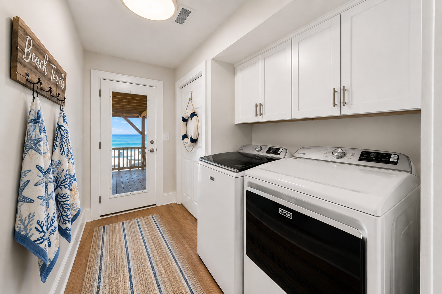 Keep sandy beach towels and vacation essentials fresh with the home's full-size laundry setup.