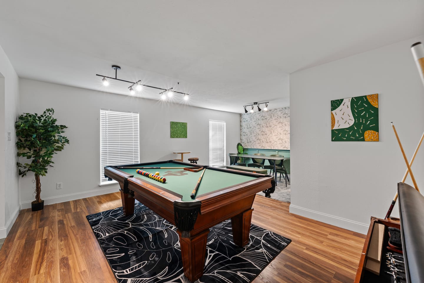 Massive game room with plenty of space for pool, seating, and game night memories.