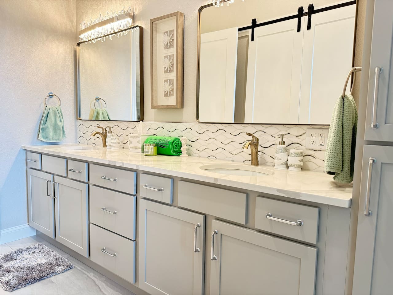 Large mirror reflect lots of light in this spacious master bathroom 