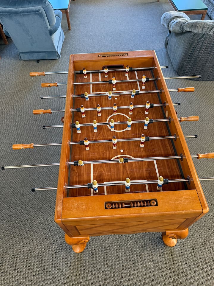 How about foosball? The foosball table is located in the shared clubhouse.