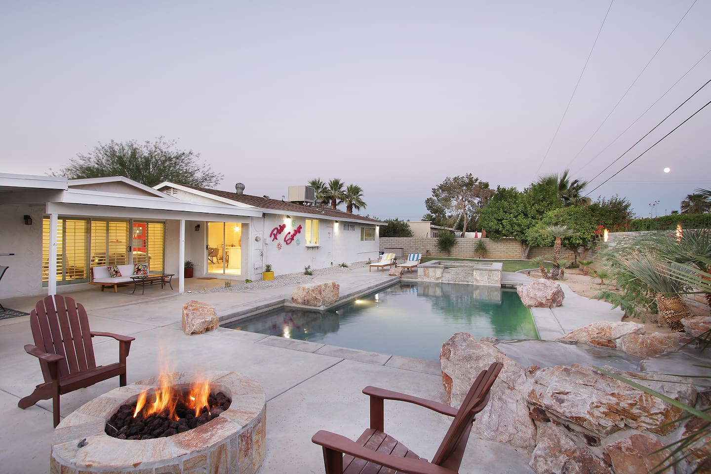 Large backyard for relaxing with fire pit and water features