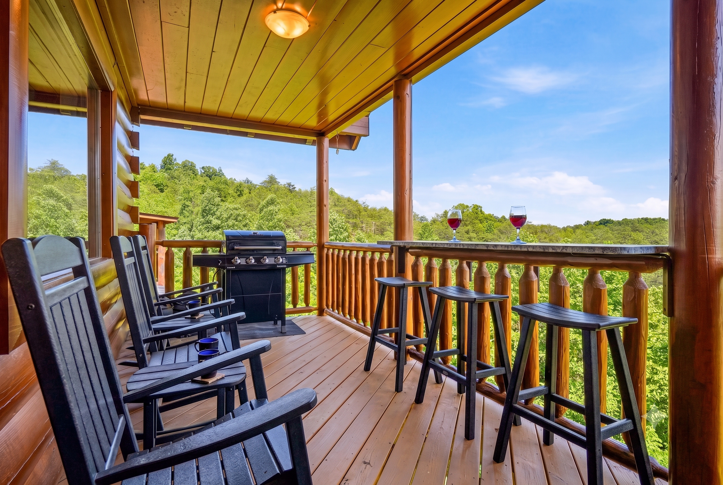 Stretch out on the main deck with rocking chairs, a grill, and a deck bar. An inviting outdoor space for morning coffee, family meals, and quiet evenings.
