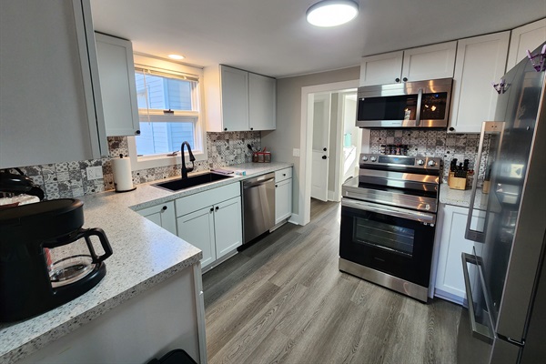 Kitchen, stove and microwave