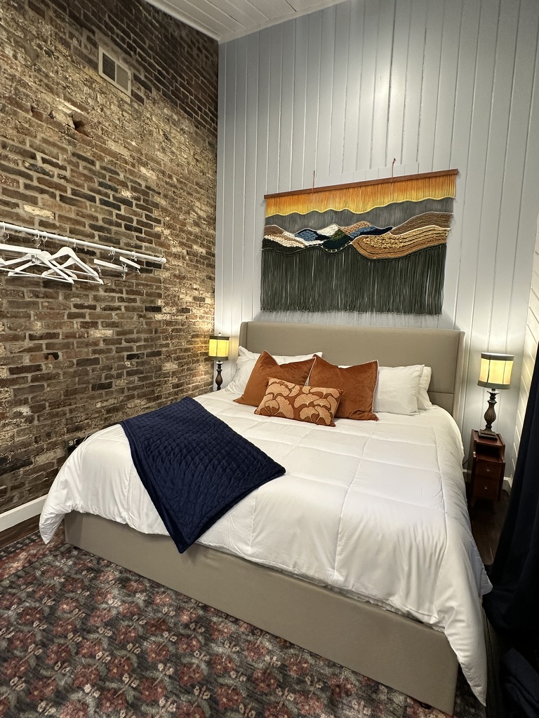 The Boho Room. Comfy King bed and pull out futon in the sitting area.