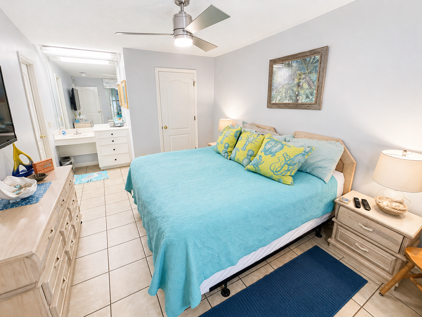 Master bedroom with a king bed and flatscreen TV