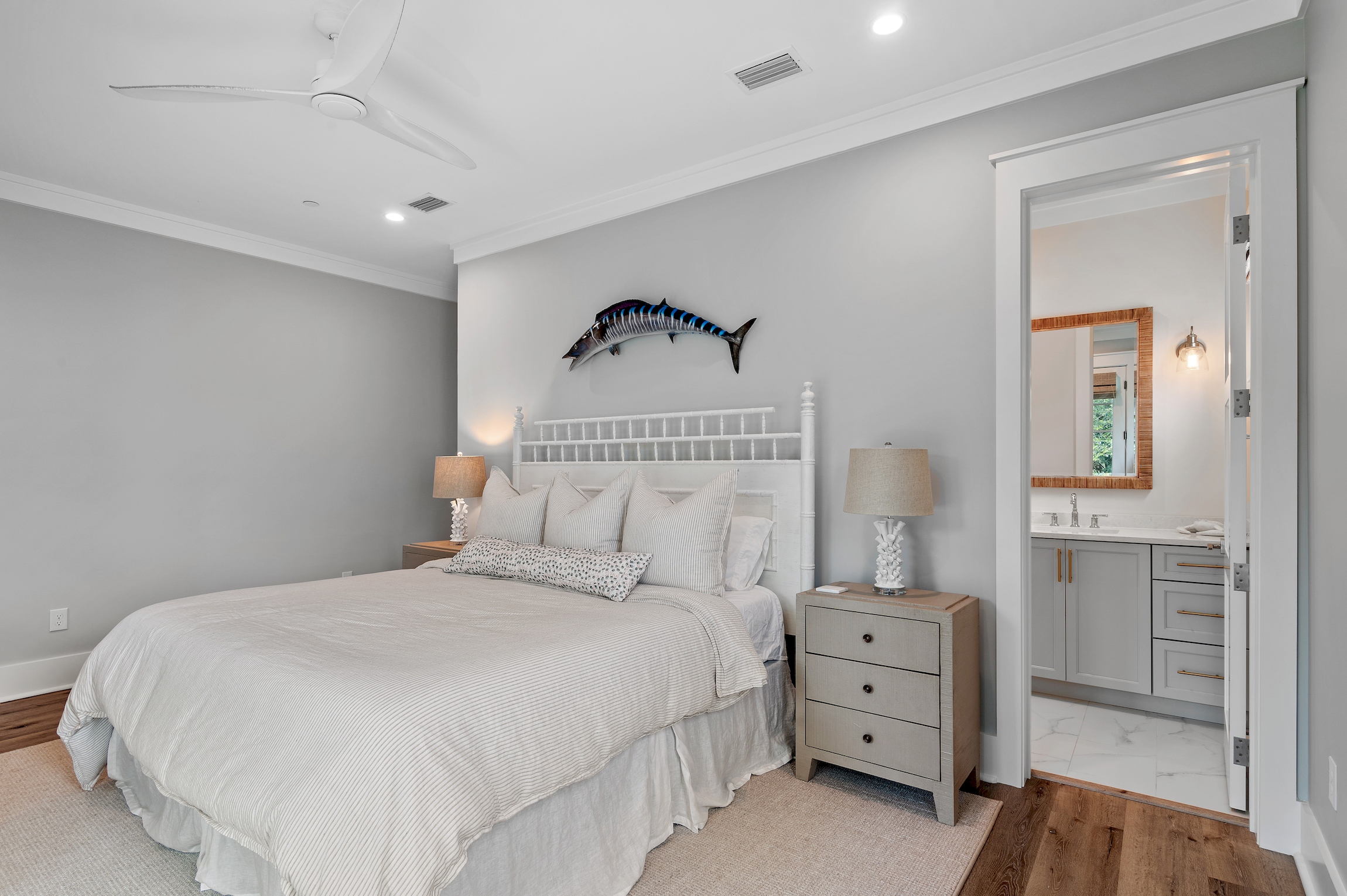 This spacious bedroom offers an ensuite bathroom and access to the deep 2nd floor front porch.