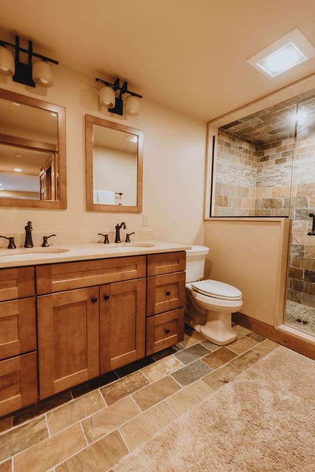 Bathroom 3 is on the lower level and is shared by bedrooms 3 and 5