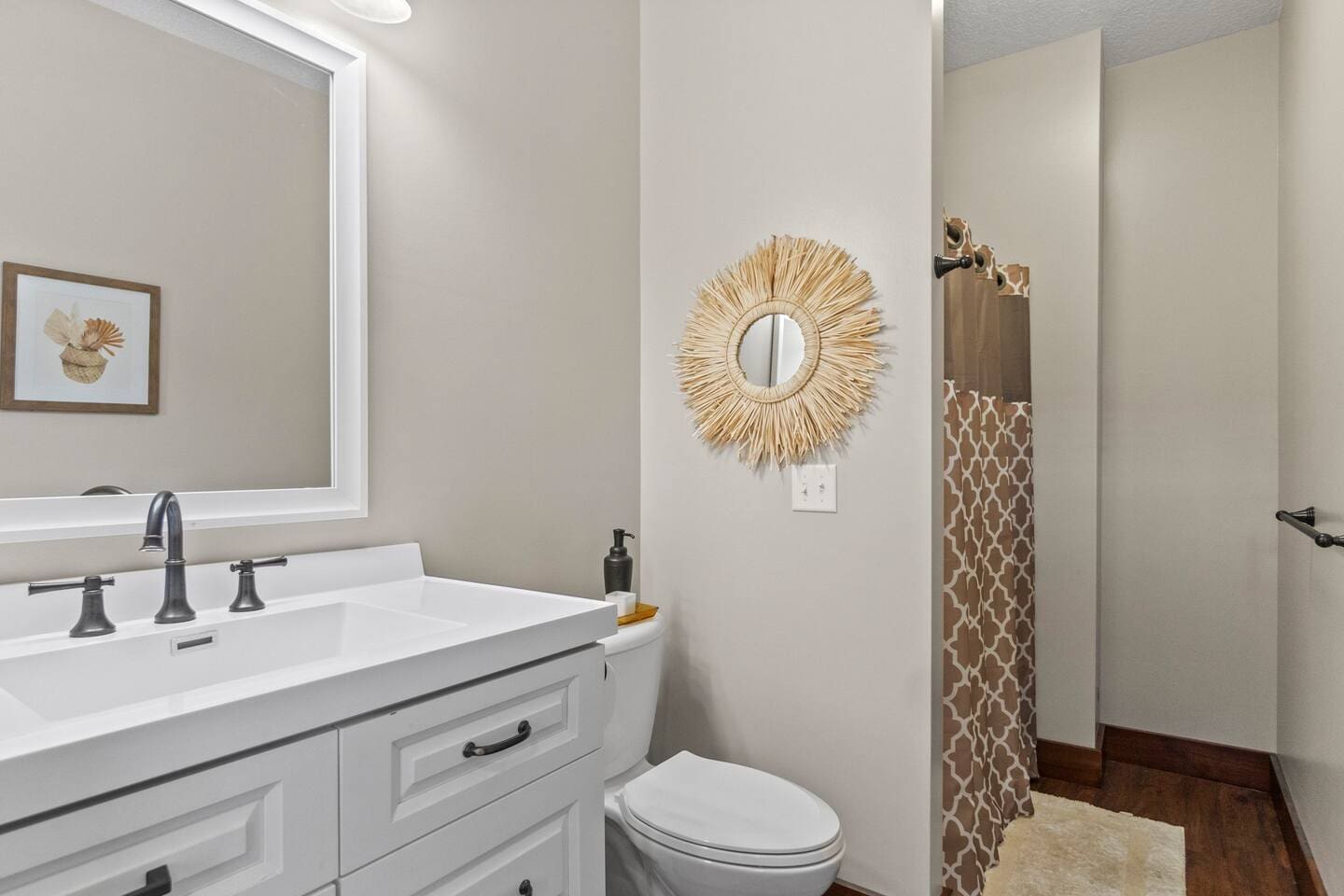 Full bathroom featuring modern fixtures, including a shower/tub, sink, and all the essentials for a comfortable stay.