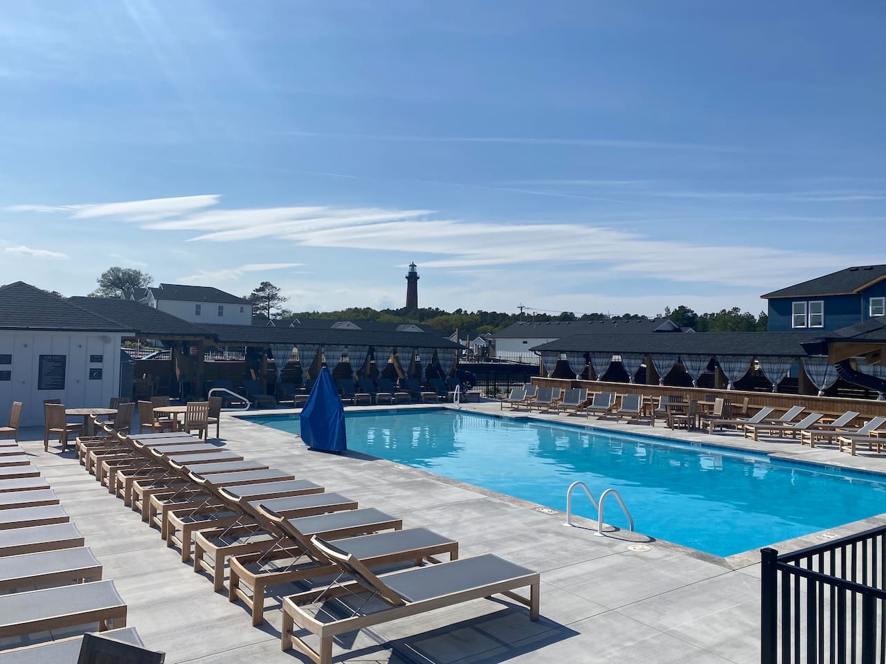 Enjoy sunny afternoons at the spacious heated neighborhood pool with plenty of lounge seating.