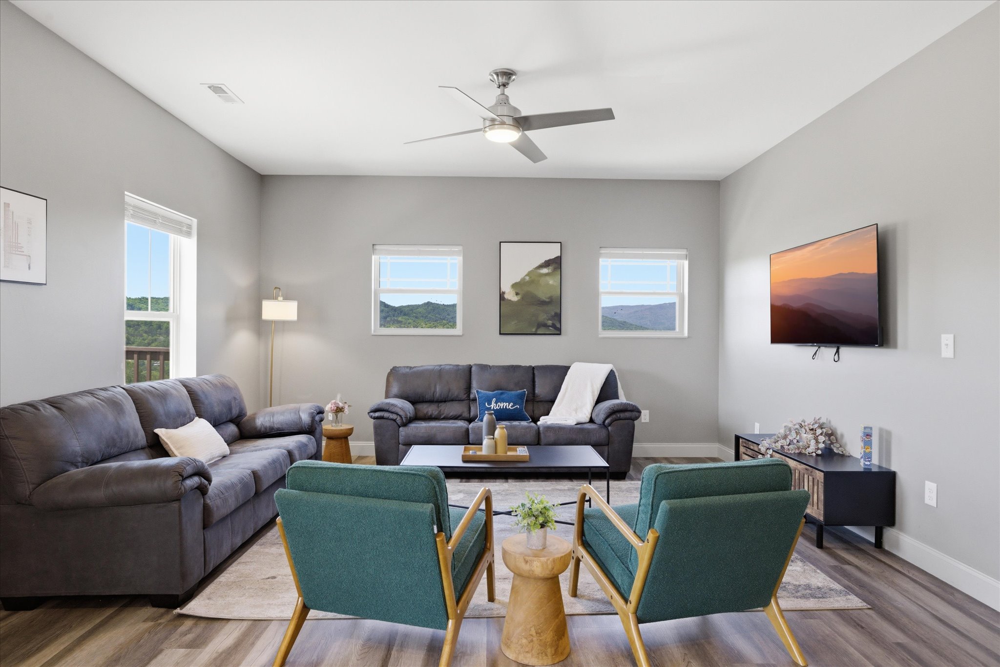 Settle into your spot—two couches, extra chairs, and enough room for everyone to land comfortably. It’s easy, relaxed, and made for time together.