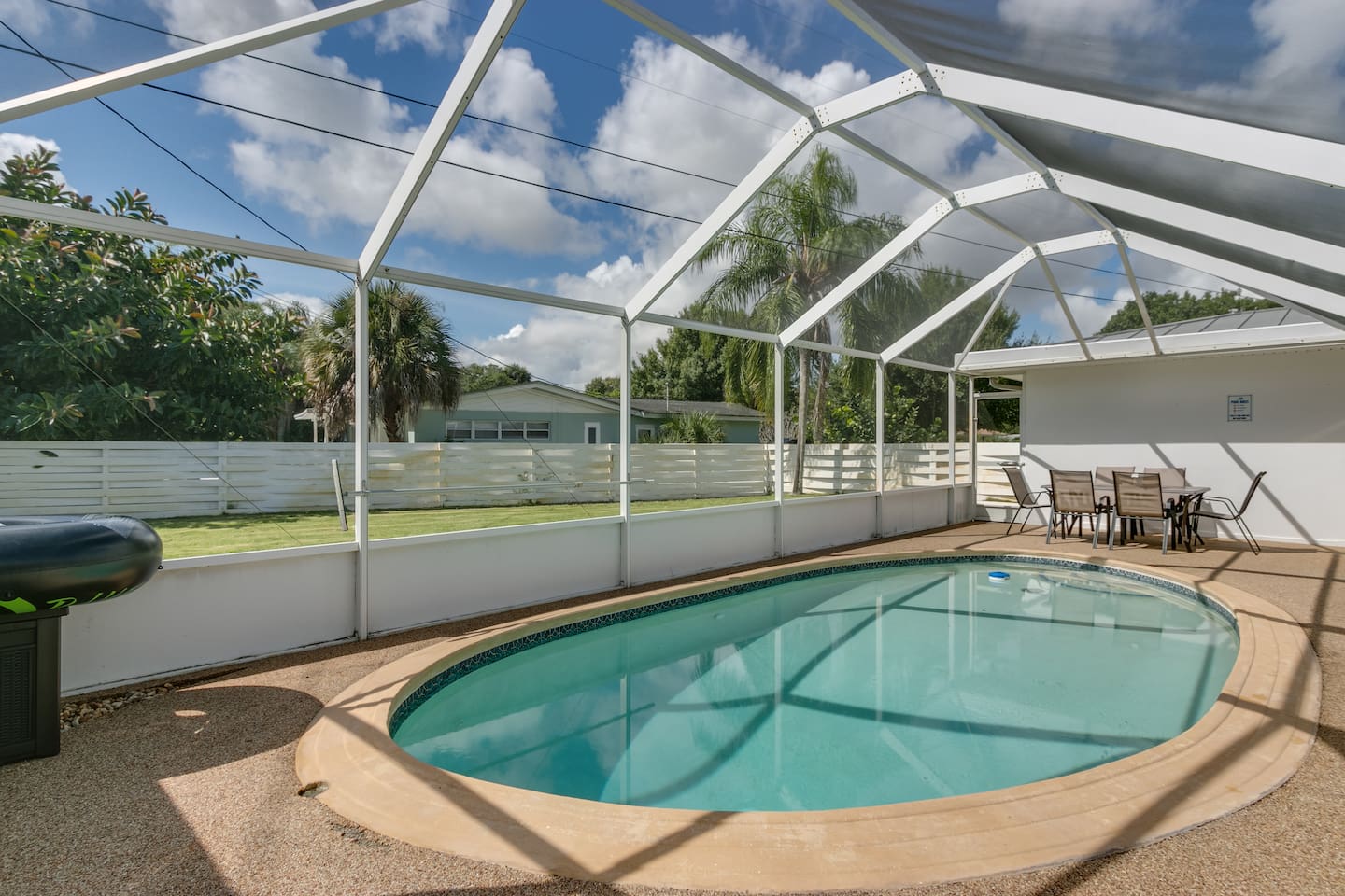 Outdoor Dining and Inground, Screened Pool (may be heated for $25/day during cold months)

GREEN HOUSE IN BACKGROUND IS ALSO OUR LISTING https://airbnb.com/h/greenway