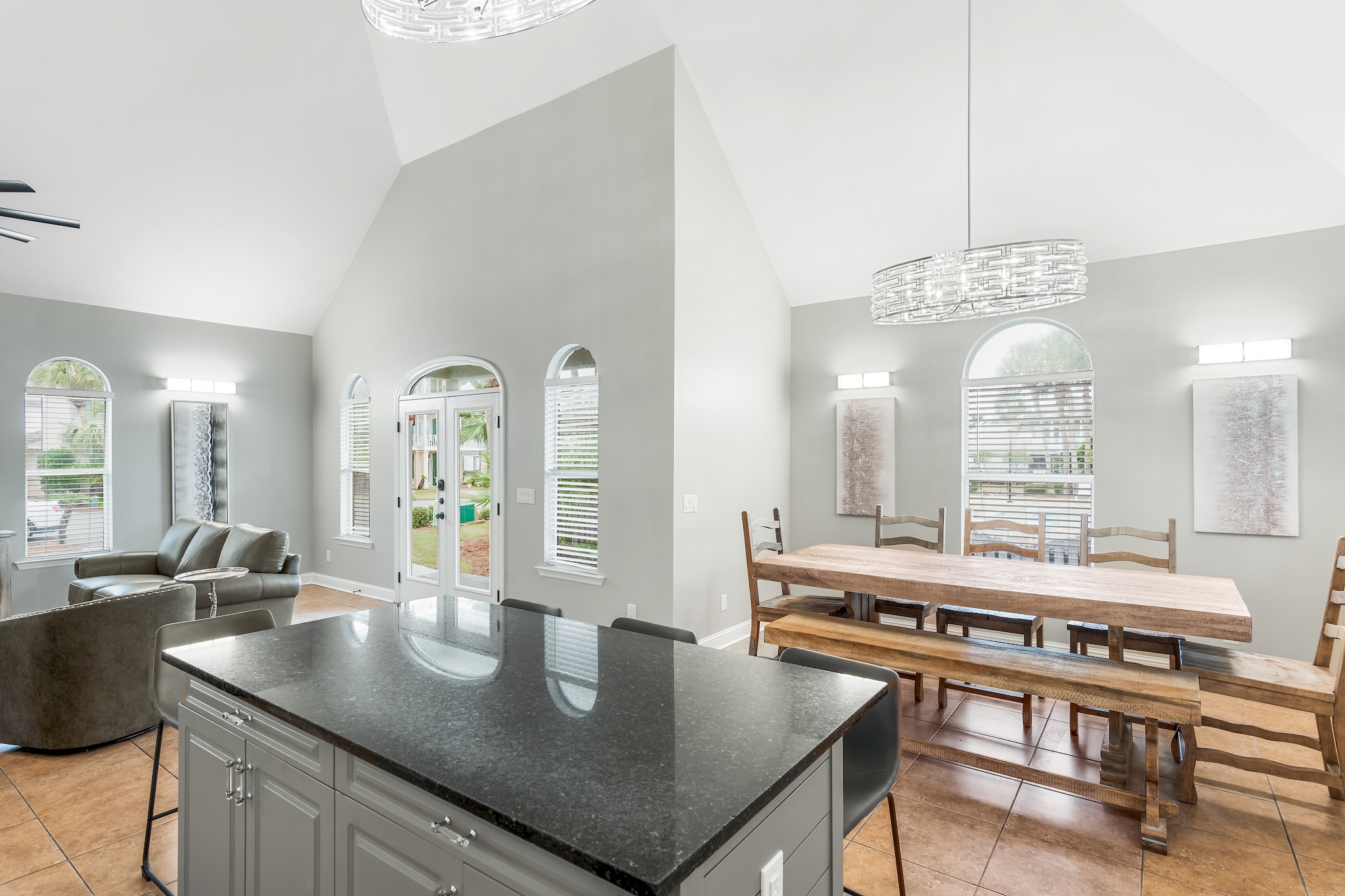 Kitchen and dining area with open sightlines to the living room