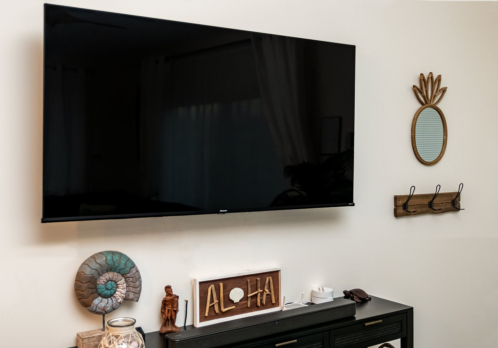 living room 1 of 2 with 4k smart tv + AC