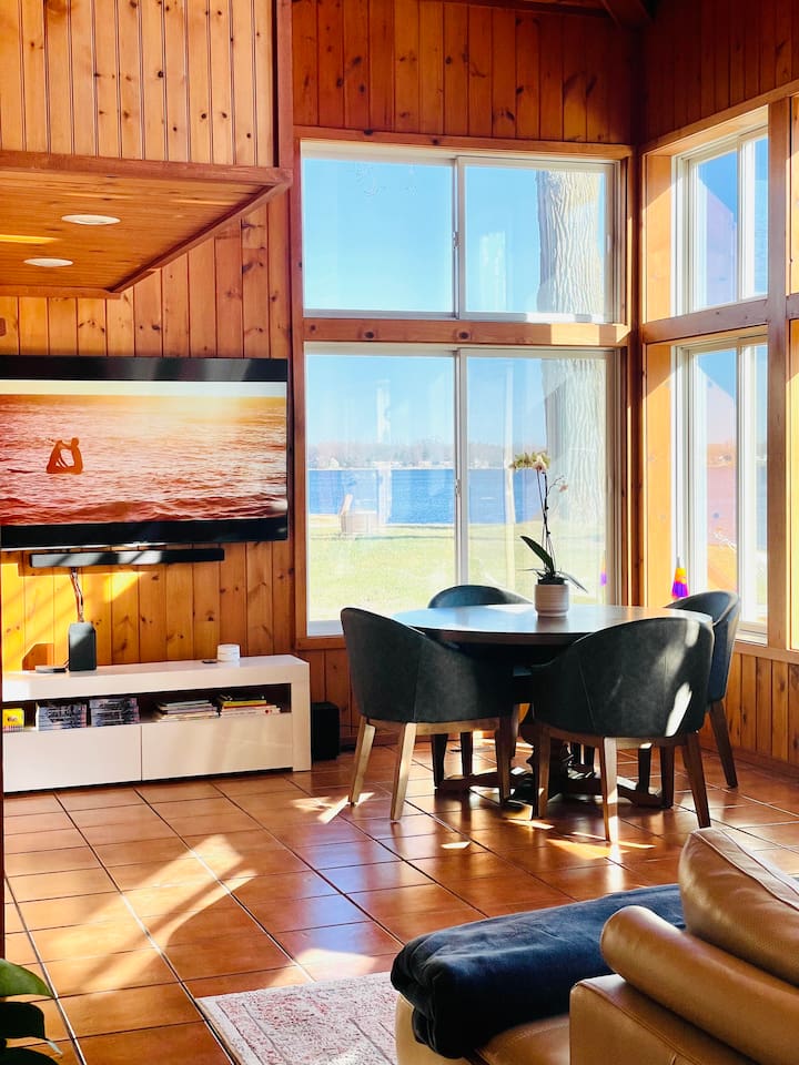 Dining area with warm natural light and space for gathering together.