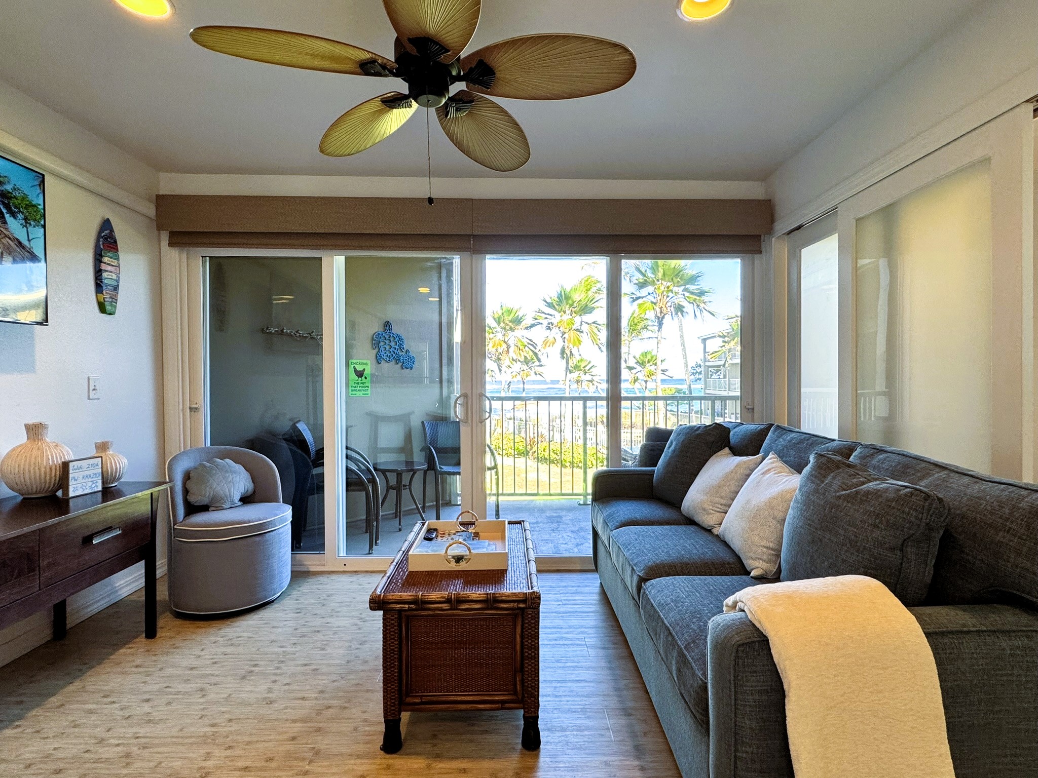 Living room with ocean and pool view