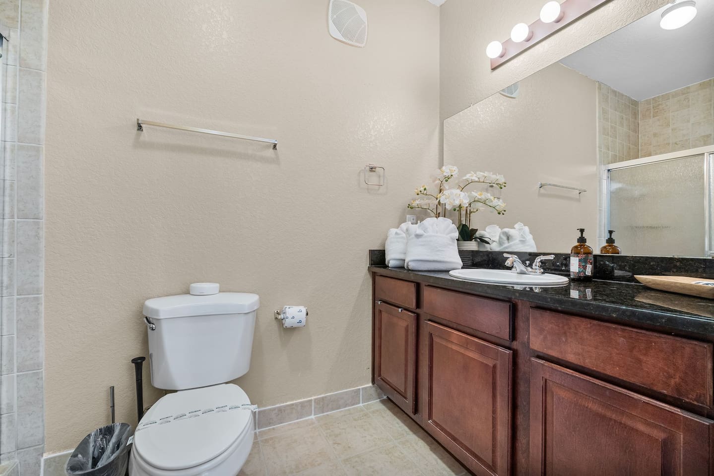 Full Bathroom 1 with stylish finishes and a spacious vanity.