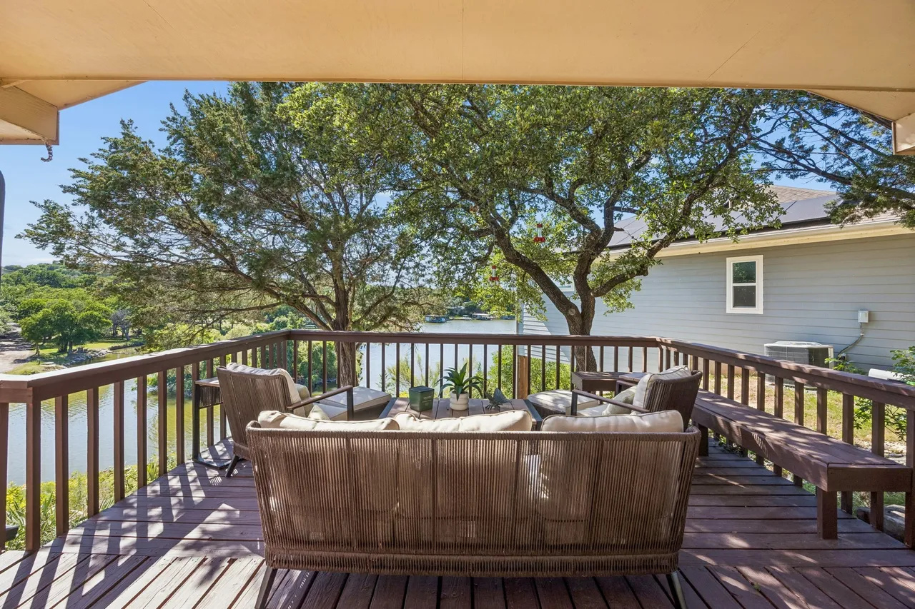 Furnished deck seating with peaceful Lake Granbury views.