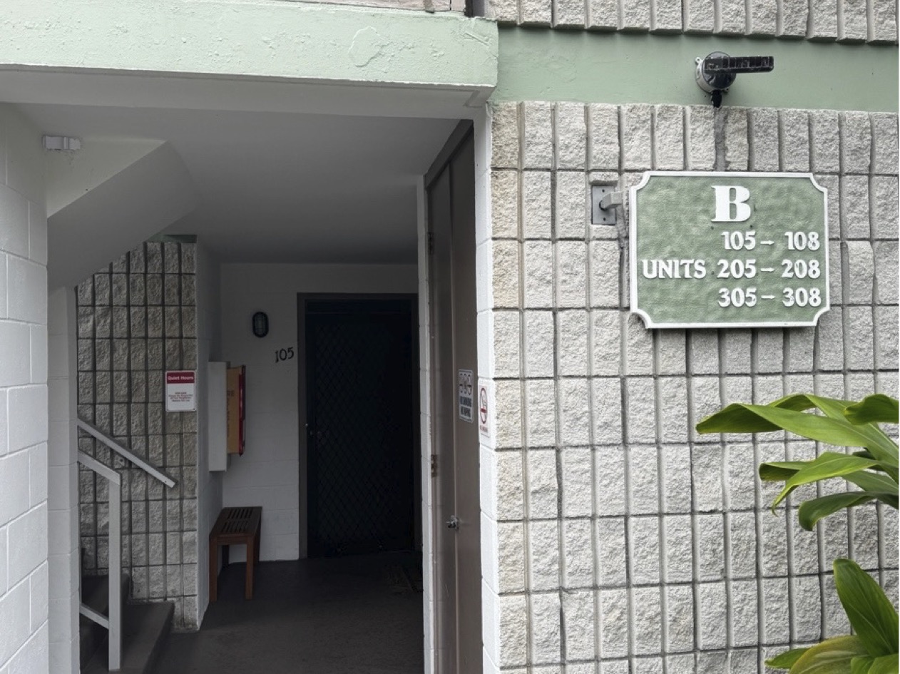 Building B entrance showing unit ranges including 205 to 208