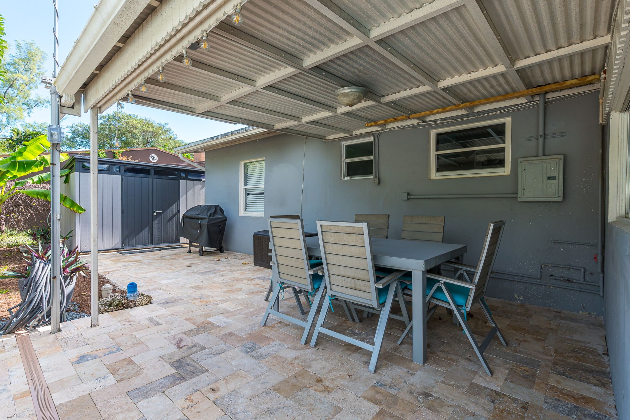 The outside is a highlight, with the heated pool, outdoor sun- loungers, BBQ and covered dining area.