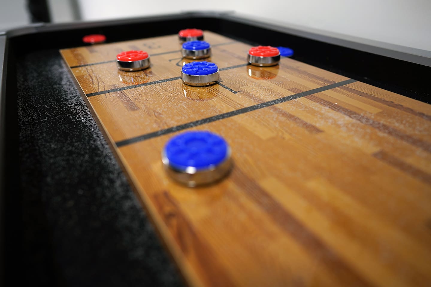 Air conditioned and heated garage space includes tons of games like foosball, air hockey, and shuffleboard.