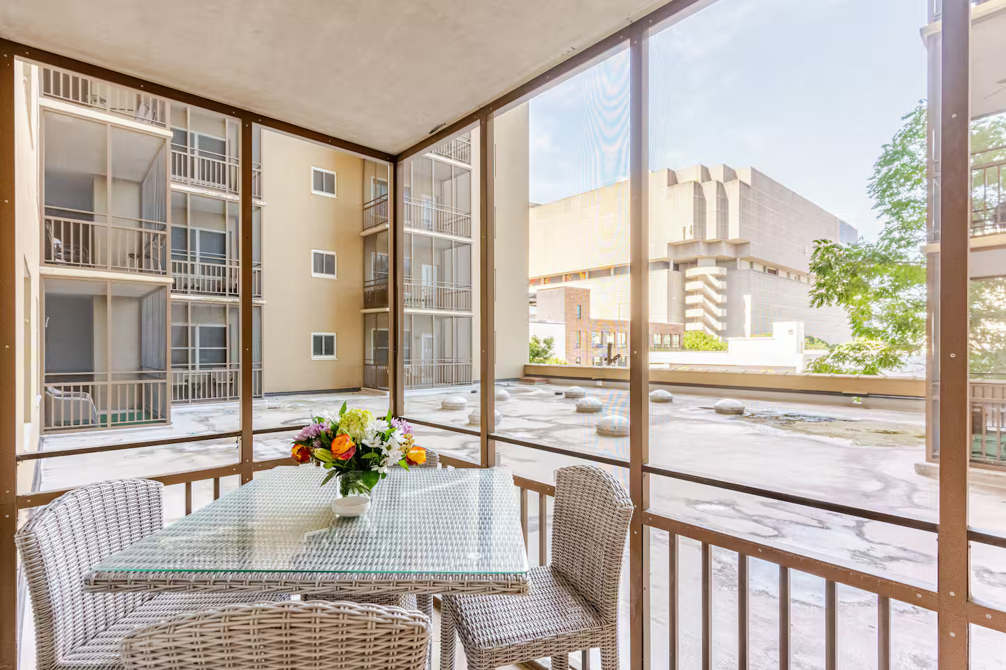 Private balcony w/ seating, ideal for fresh air & quiet moments while enjoying the barbecue grill. 