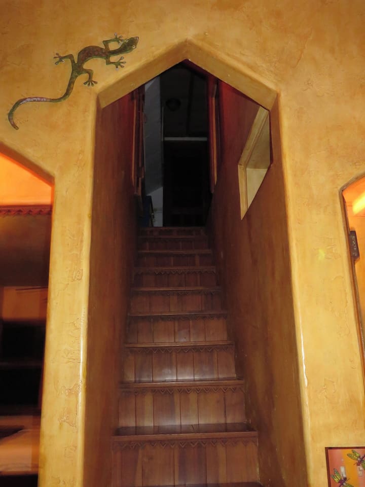 Stairs to bedroom #3 off the living room.