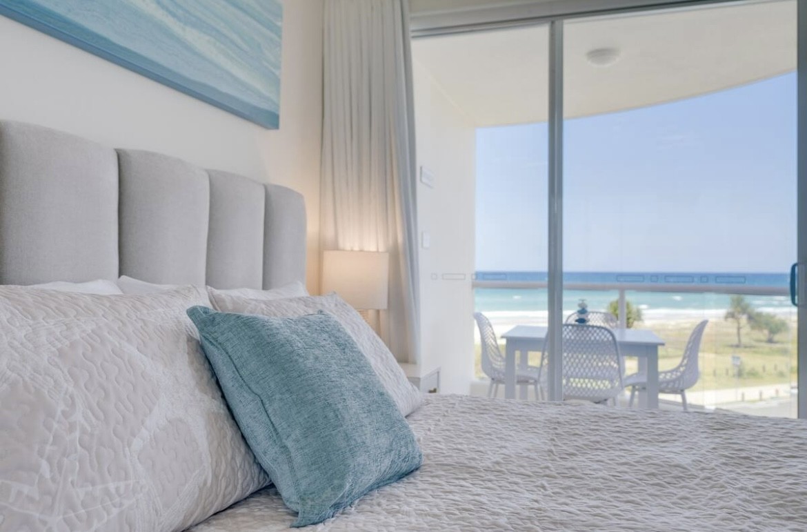 Bedroom with Beach views and Balcony access