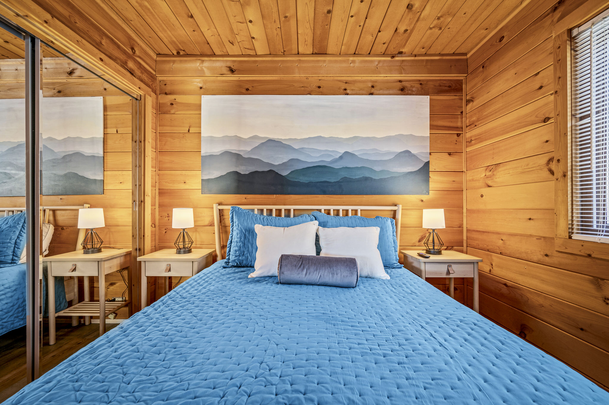 The queen bedroom is on the main floor and recently updated with a new 50in SMART ROKU TV