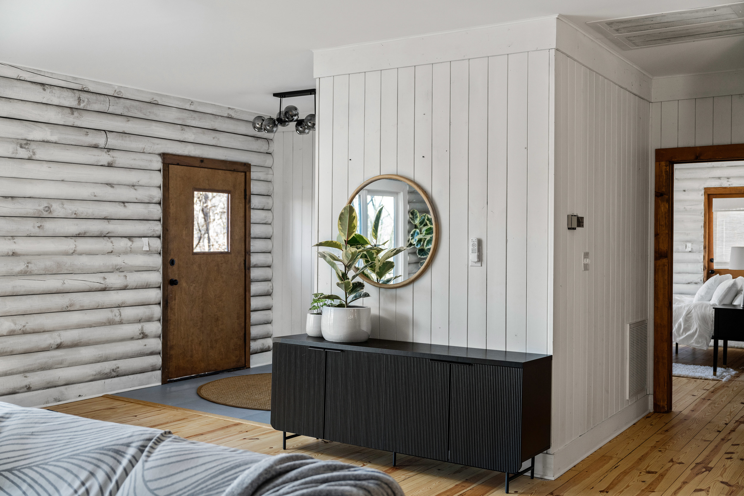 Entryway: Bright and inviting, featuring natural wood accents and stylish decor for a warm welcome!