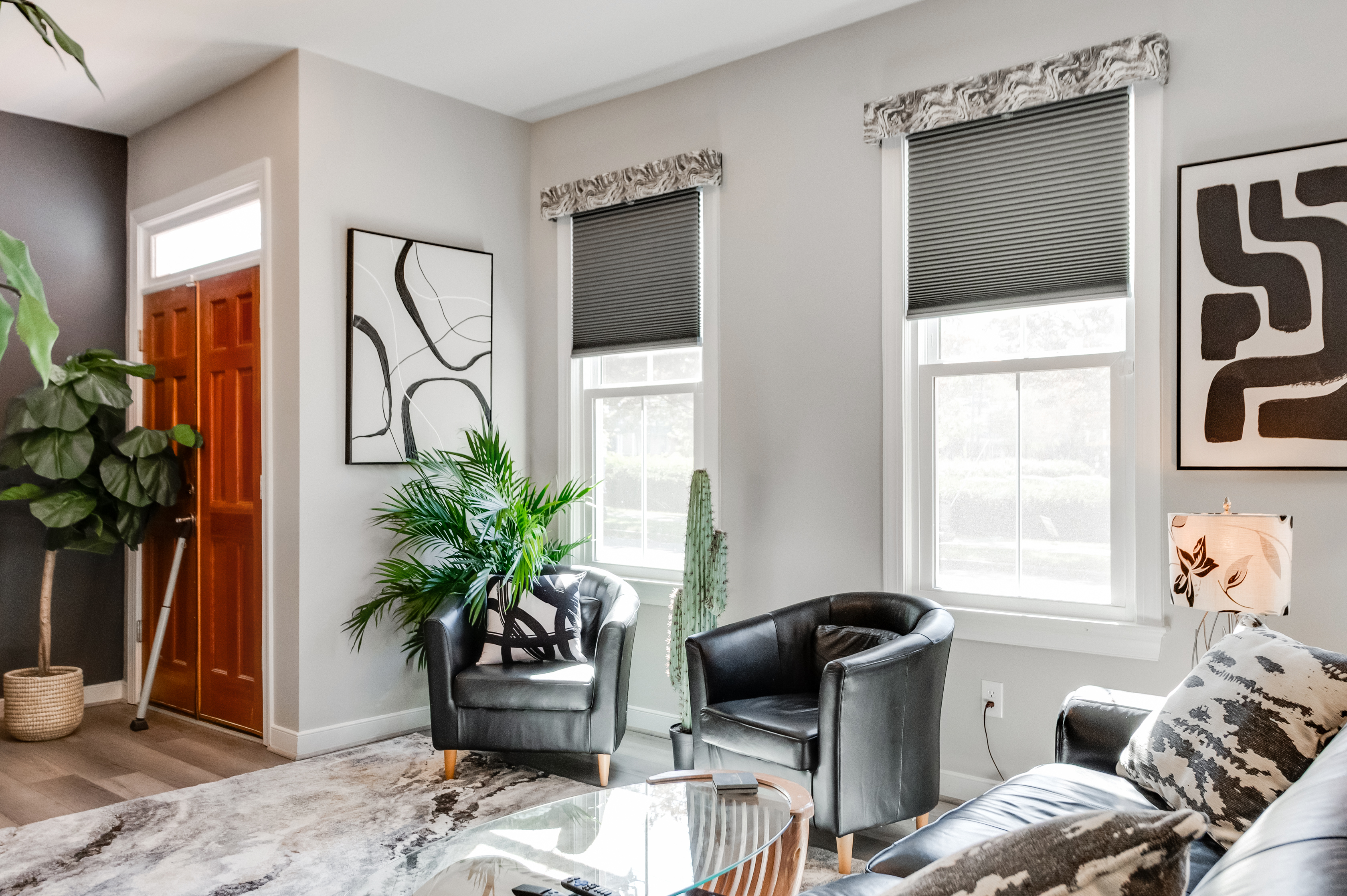 Living Room: Bright and inviting space with stylish decor, perfect for relaxation and gathering!