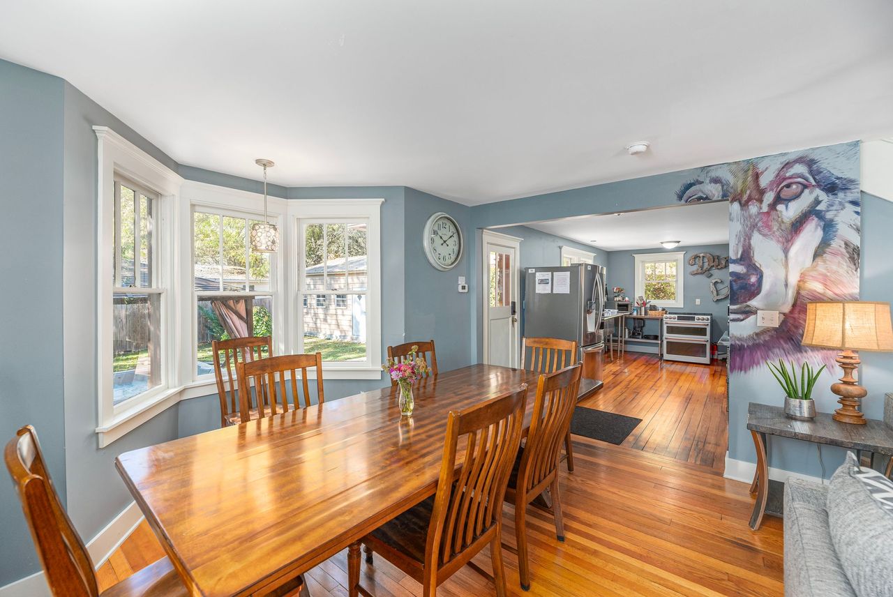 The previous owner left his mark on the house with murals on the walls, adding personality to this sweet stone cottage. 