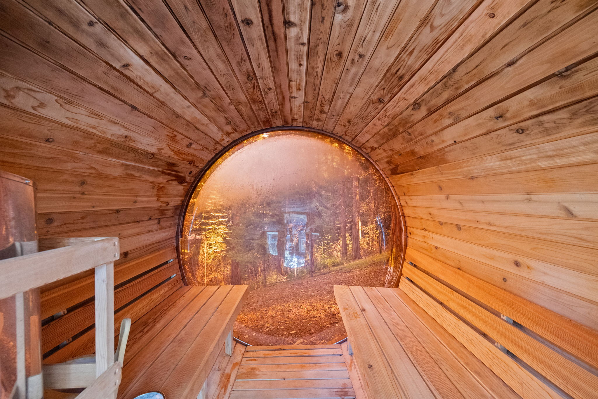 Sauna with a picture window in the back to view the forest while you relax.