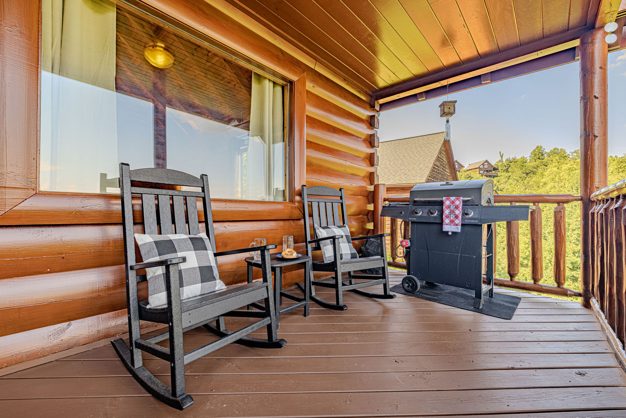 Grill, gather, and take in the mountain air—upper deck with seating for four.