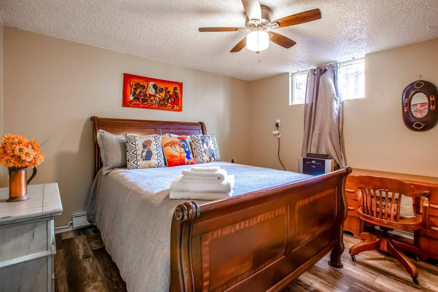 Lots of lighting coming through even in the bedrooms.  Whinter Portable AC and ceiling fan helps keep the space cool during the summer.