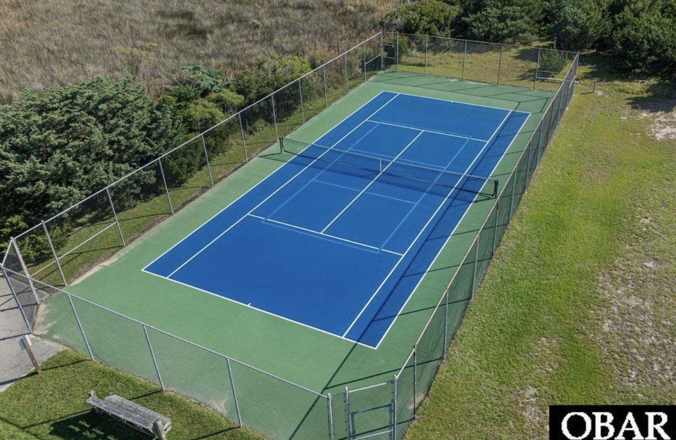 Bring your racquets our community pickleball & tennis court across the street