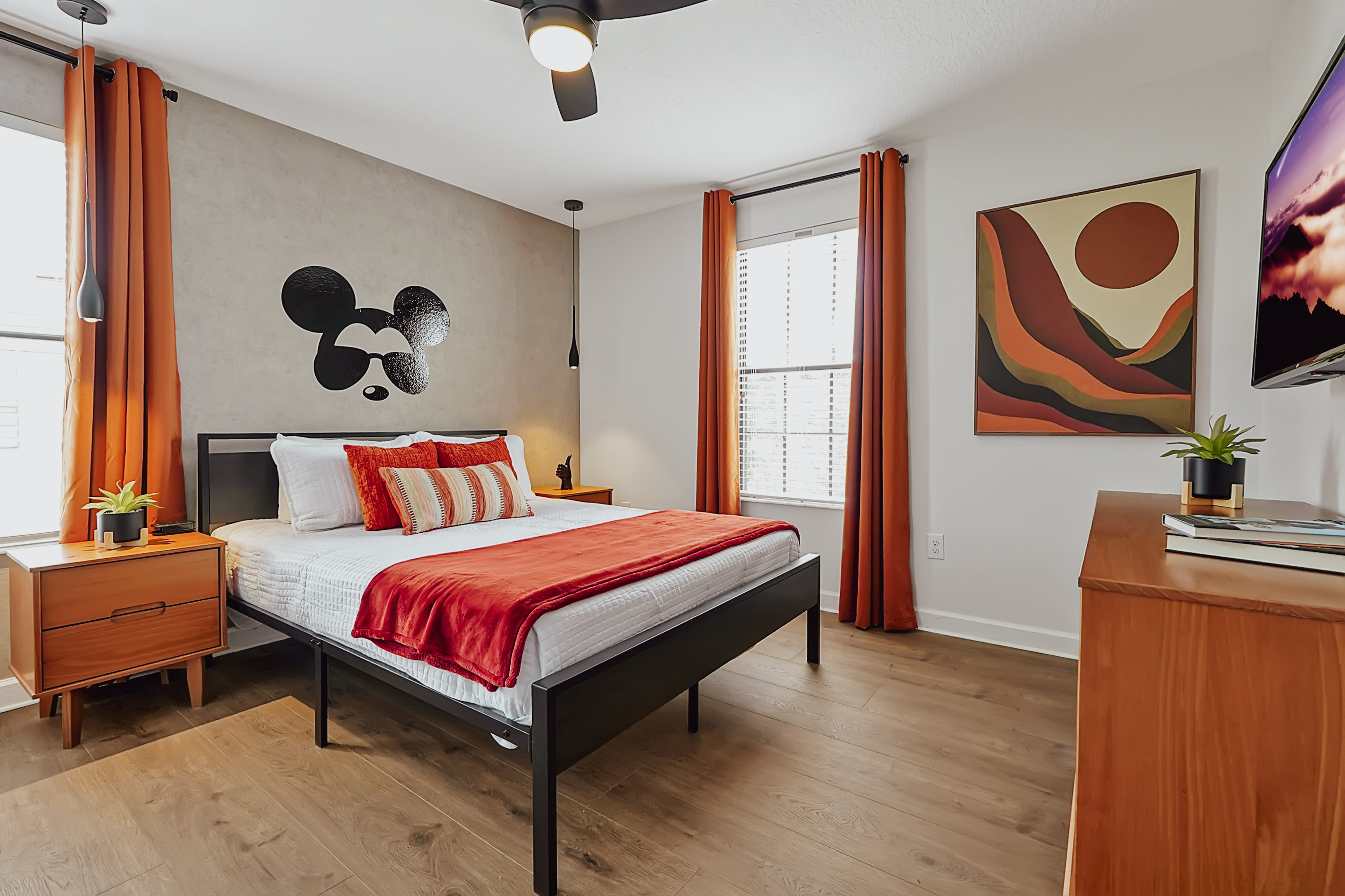 This modern Mickey room is perfect for the older kids who say they are “too old” to sleep in a themed room. 