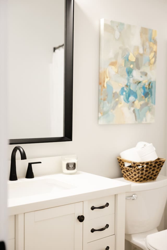 This full bathroom is located on the first floor at the hallway off the bottom of the main staircase. It includes a bathtub with shower. 