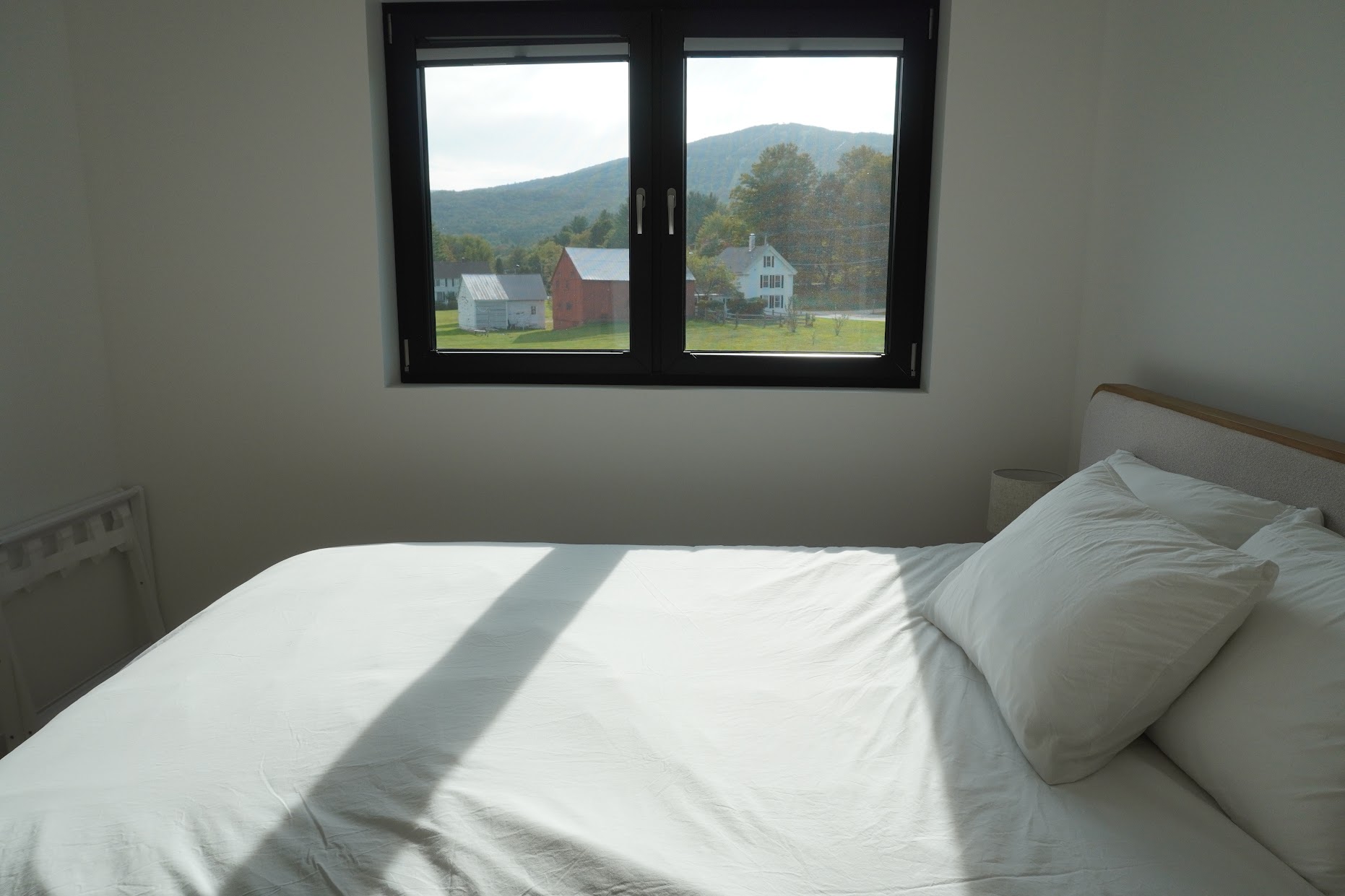 This bedroom has some great views.