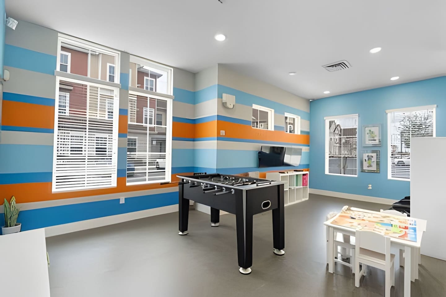 Challenge your group to a foosball match or relax in this vibrant game room.