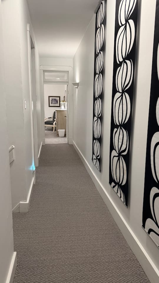 Primary bedroom located at the front of the home, just off the main hallway.