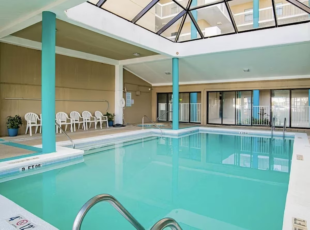 Indoor atrium pool - heated in winter! Beach towels also provided in your condo.