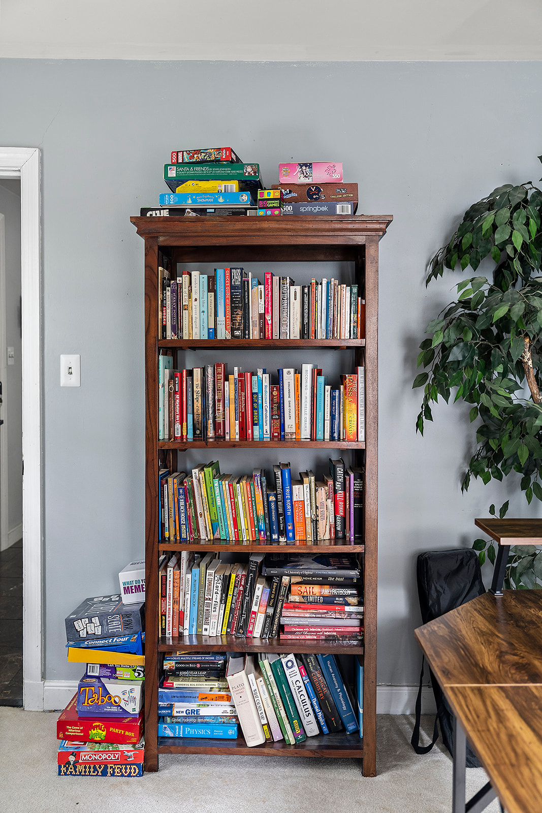 Office Nook: Dive into a world of stories with our charming bookshelf and playful games!