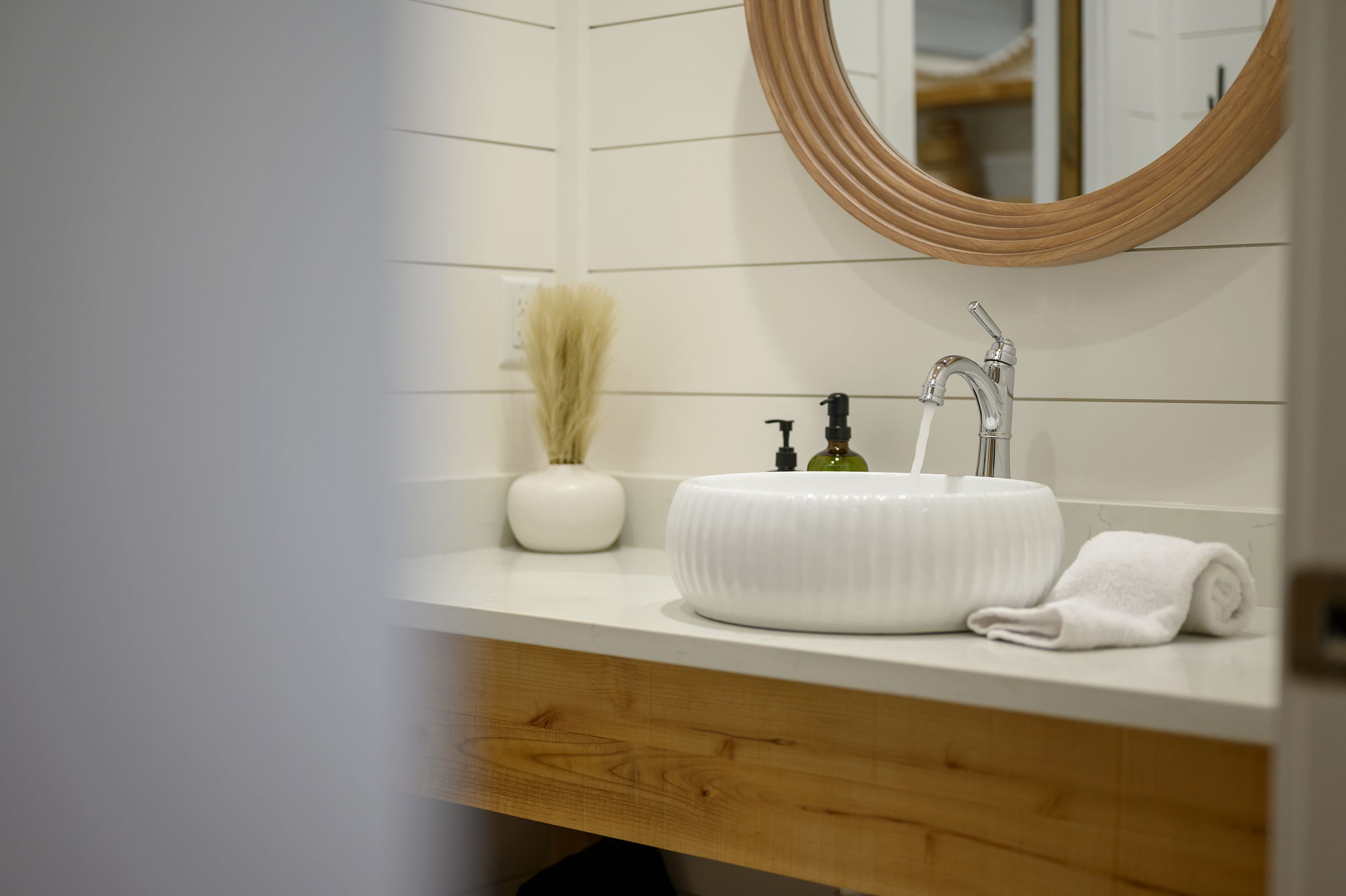 The private casita ensuite bathroom offers a luxurious, spa-like experience with premium finishes, warm design touches, and complete privacy—creating the perfect place to relax and recharge.