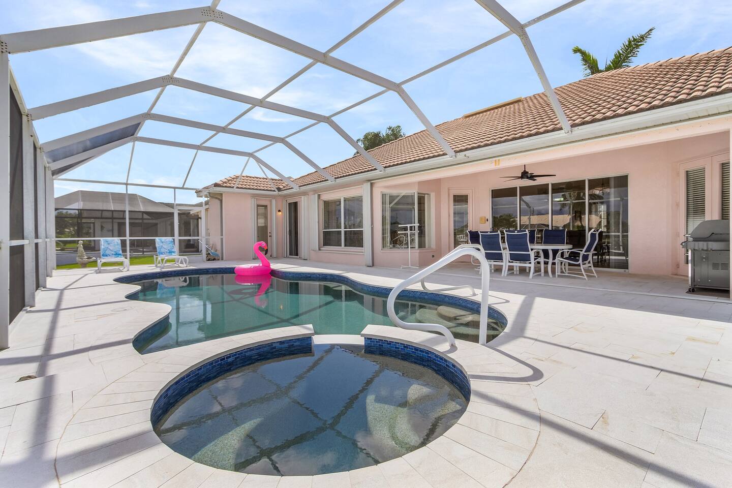 Experience ultimate Florida outdoor living with a pool, spa, lounge chairs, and ample sunshine for the perfect day of relaxation and fun!