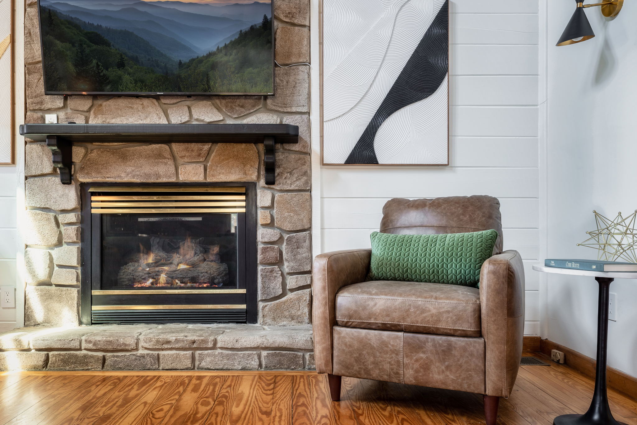 Cozy up by the fireplace and let its warmth embrace you. The perfect spot to unwind after a day of adventure.