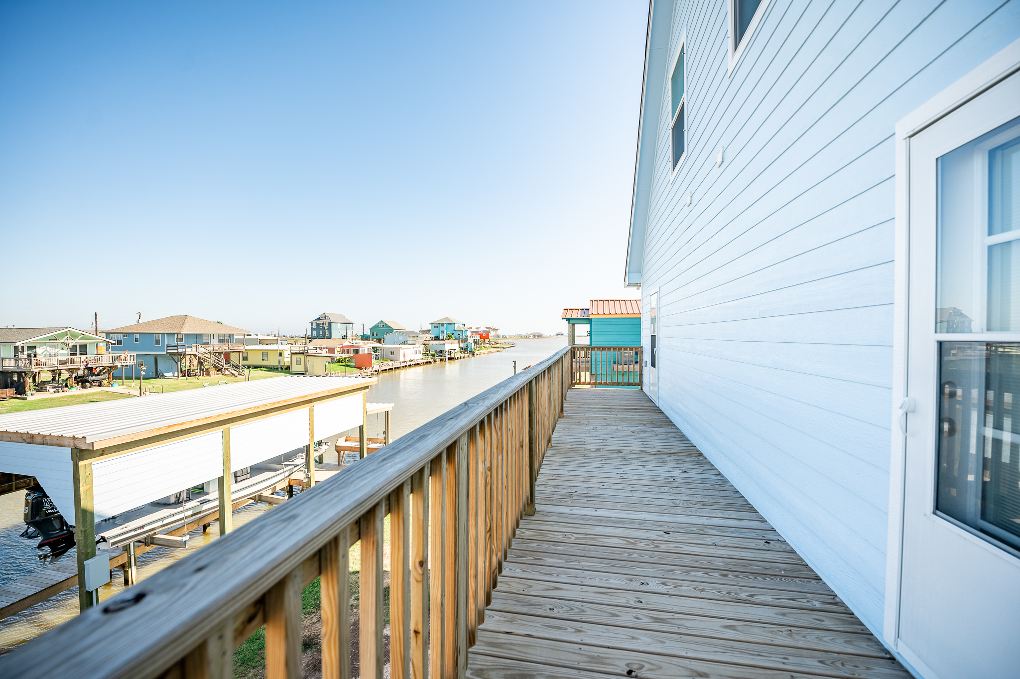 balcony facing the canal, between primary and twin bedrooms