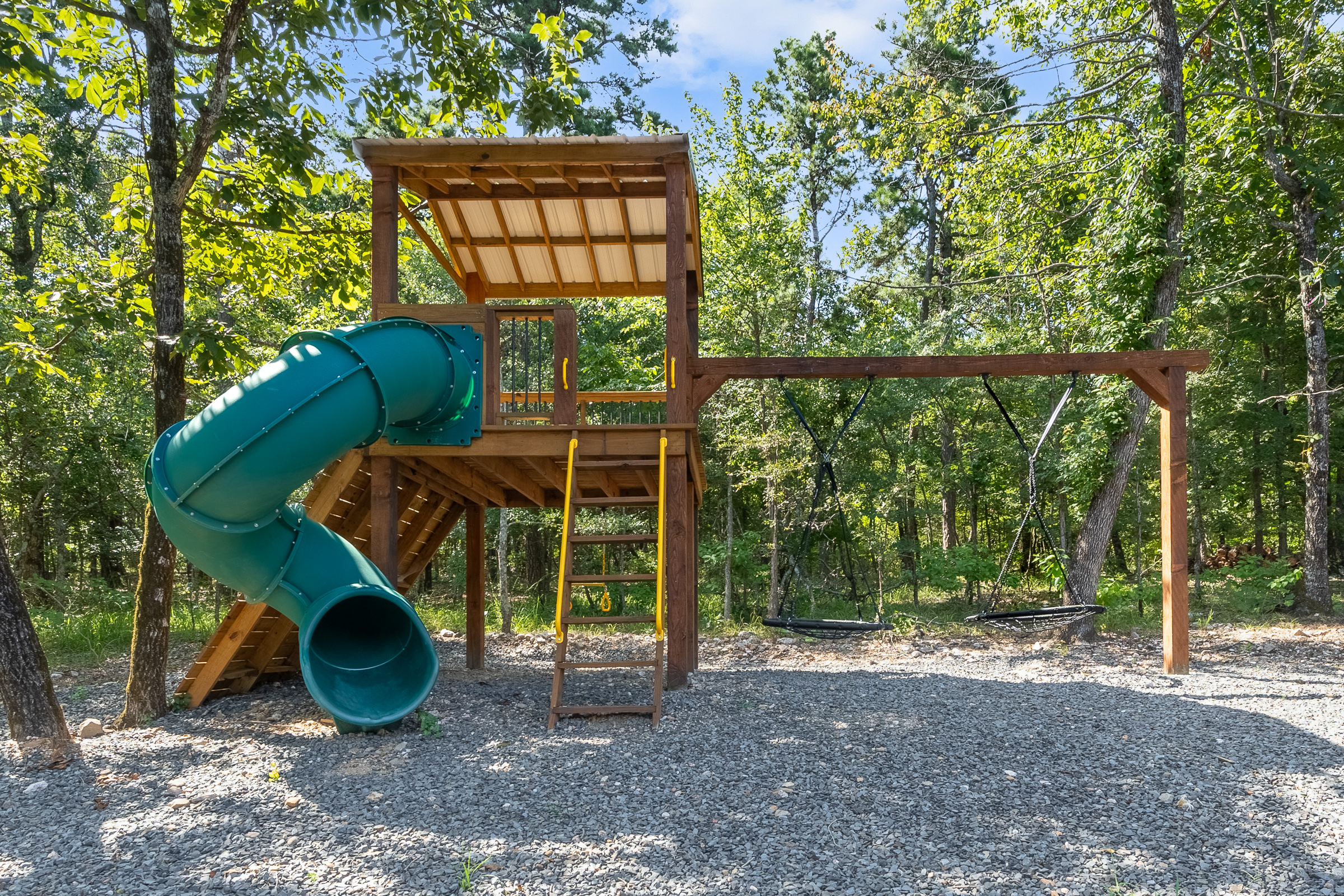 Kids love it in their large, personal tree house. Complete with slide, swings, and climbing wall