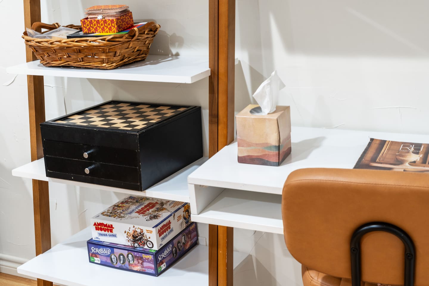 From Scrabble to chess, this cozy nook is stocked with classic games for relaxing nights in or friendly competition.