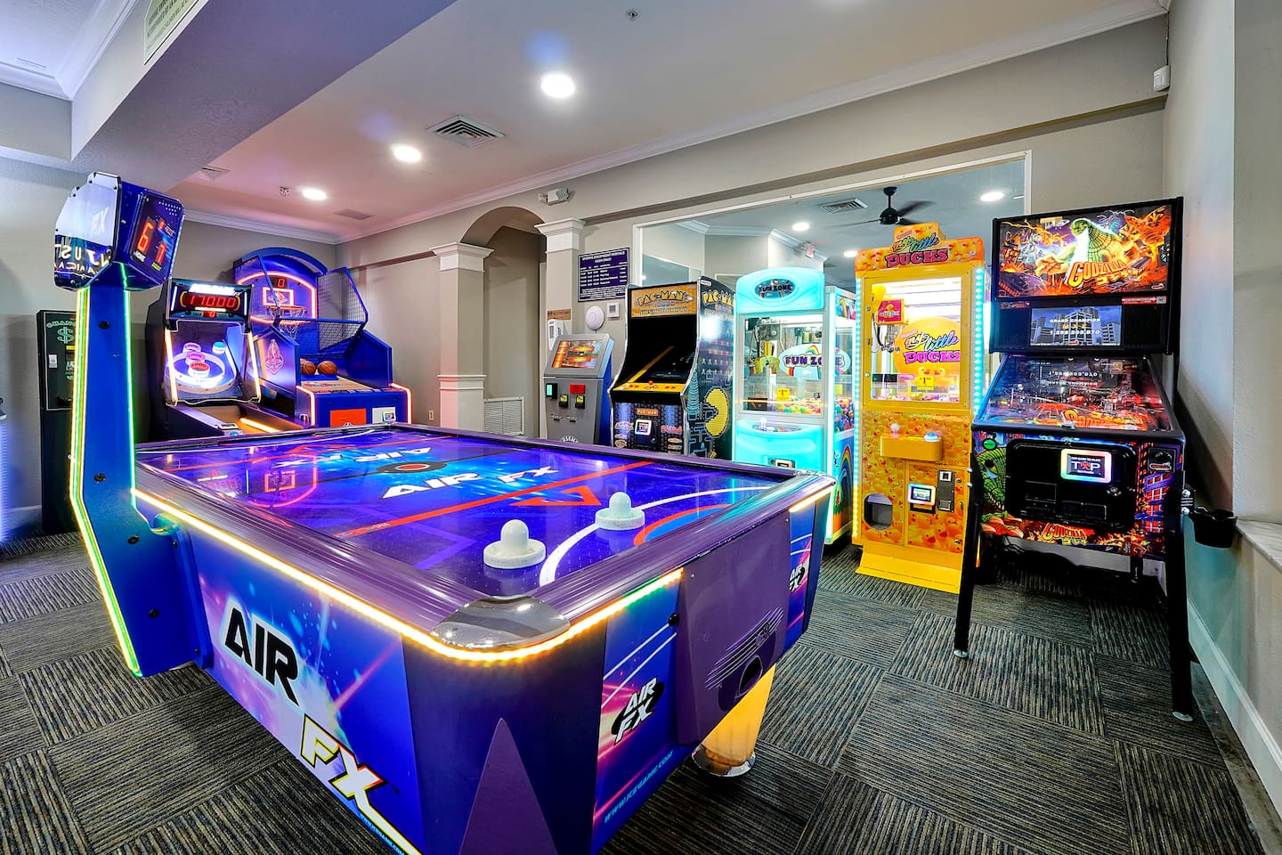 Enjot many arcade games including air hockey.