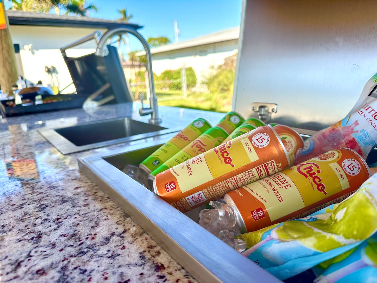built in ice chest for cold drinks by the grill